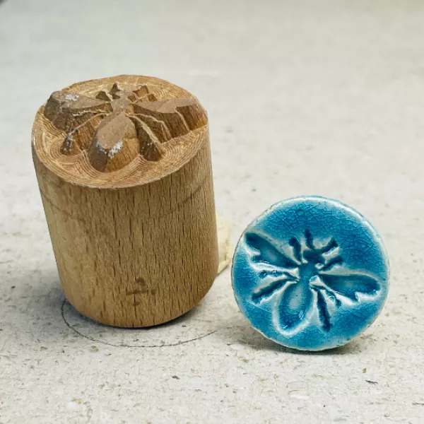 bee clay stamp
